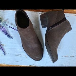 Brown booties by Carlos